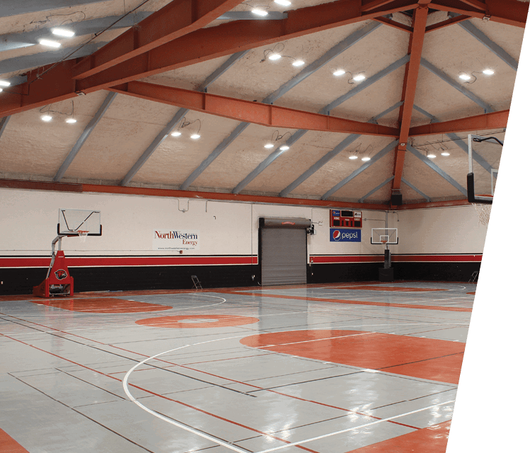 A basketball court with a hoop and a red backboard. AI generated content