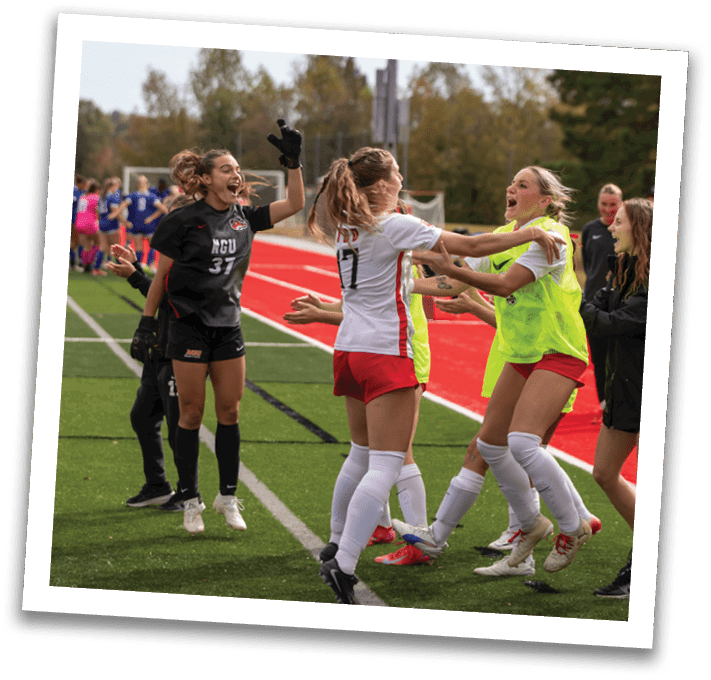 A group of women celebrating on a field. AI generated content