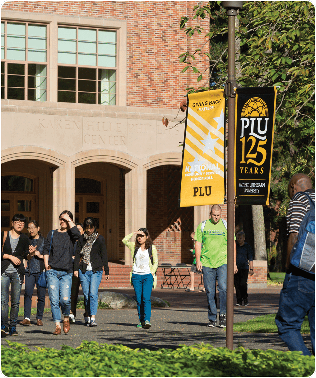 Students making their way across Red Square at PLU on Thursday, Sept. 11, 2014. (Photo/John Froschauer