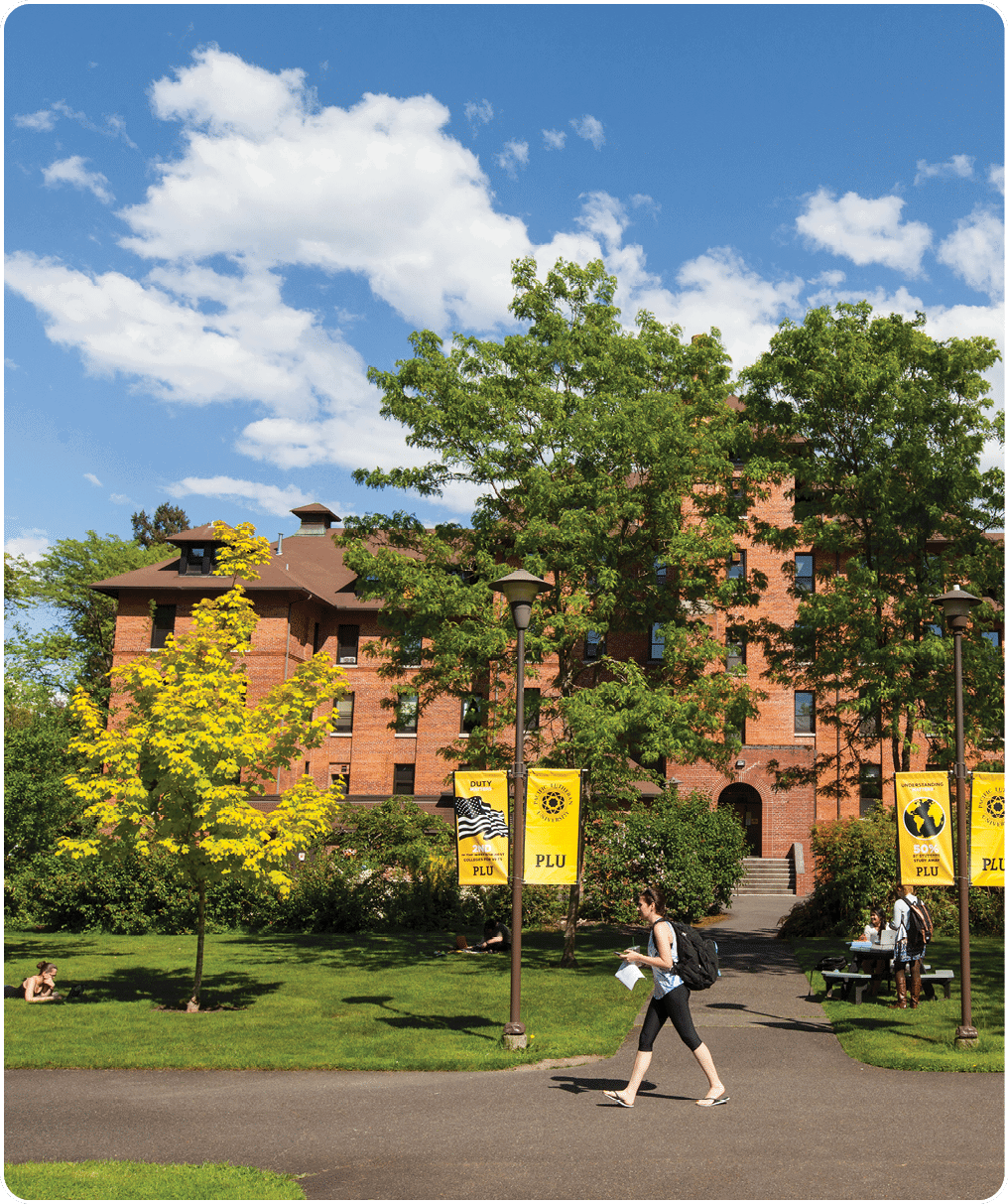 Harstad hall with students in the warm spring day at PLU on Monday, May 2, 2016. (Photo: John Froschauer/PLU)