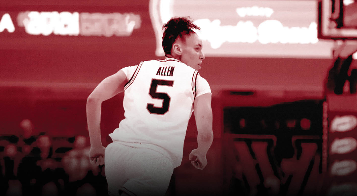 A person wearing a white sports jersey with the name “ALLEN" and number 5 on the back is in an athletic stance on a basketball court. Description generated by AI