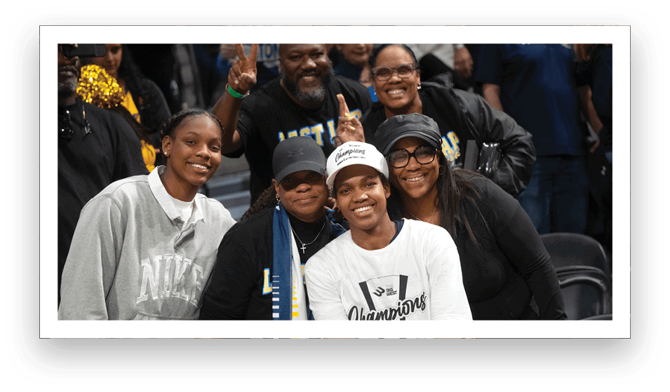 A group of people celebrating a victory, with one person holding a trophy. AI generated content