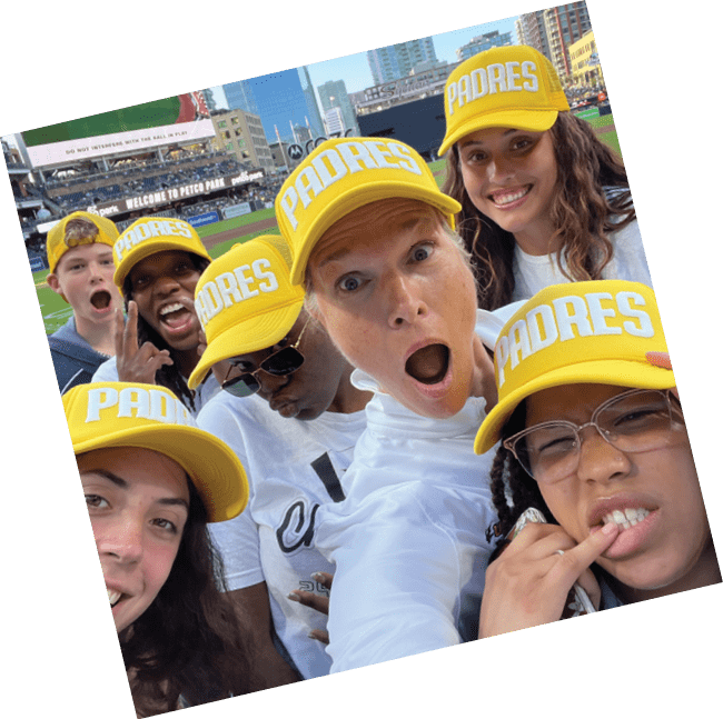 A group of people wearing yellow hats are posing for a picture. AI generated content