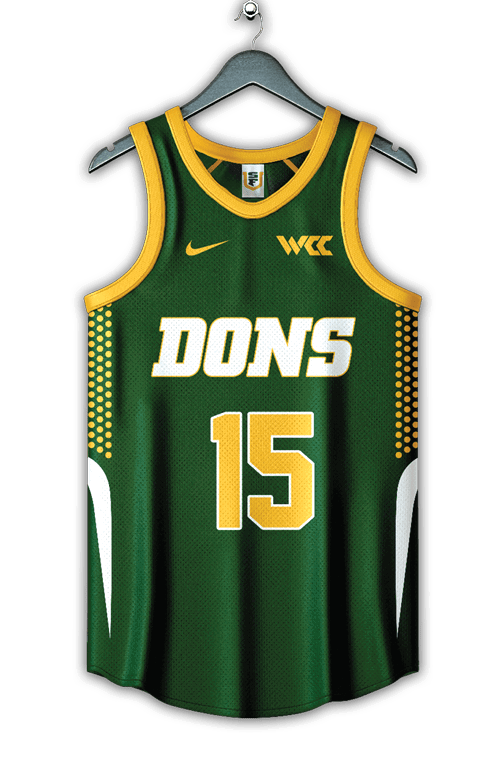 A green basketball jersey with yellow trim featuring the word “DONS," the number 15, a Nike logo, and a WCC logo. Description generated by AI